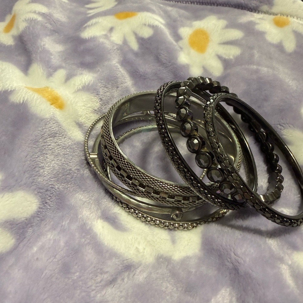 Stylish Silver and Black Bangle Set
You get all for one low price - Picture 2 of 12